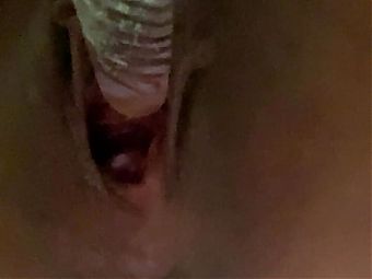 Using glass dildo in pussy close up